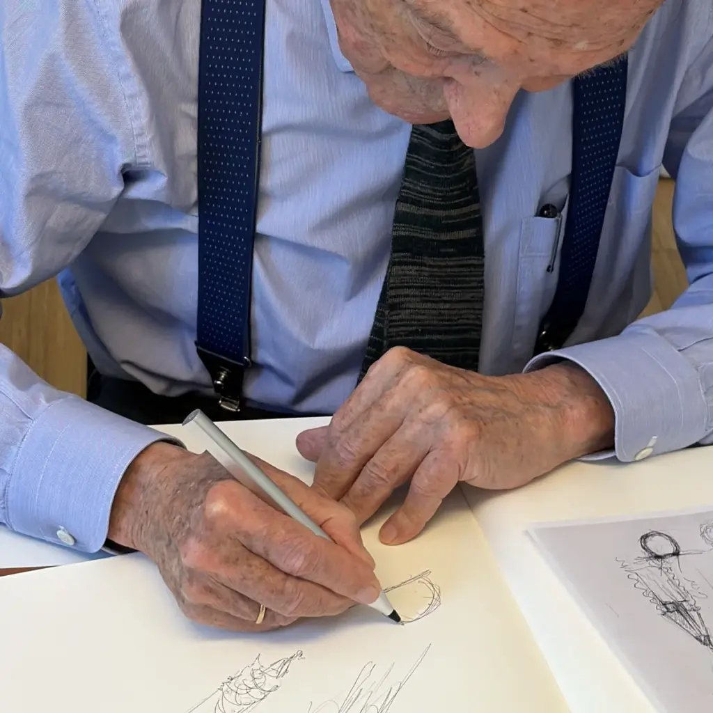 Architect Rafael Moneo sketching by hand at his desk
