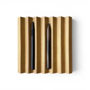 Lebond wooden pen stand in Iroko wood holding two Lebond pens, handmade in Spain