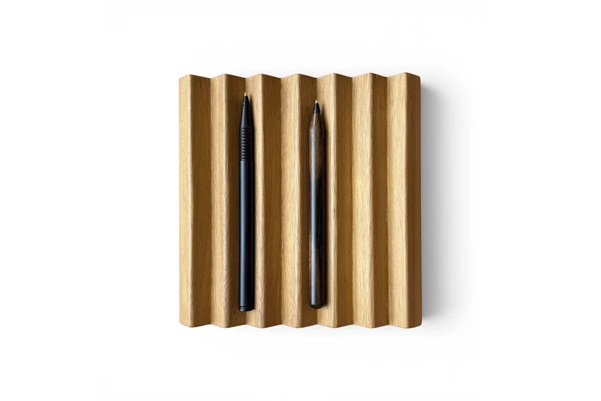 Lebond wooden pen stand in Iroko wood holding two Lebond pens, handmade in Spain